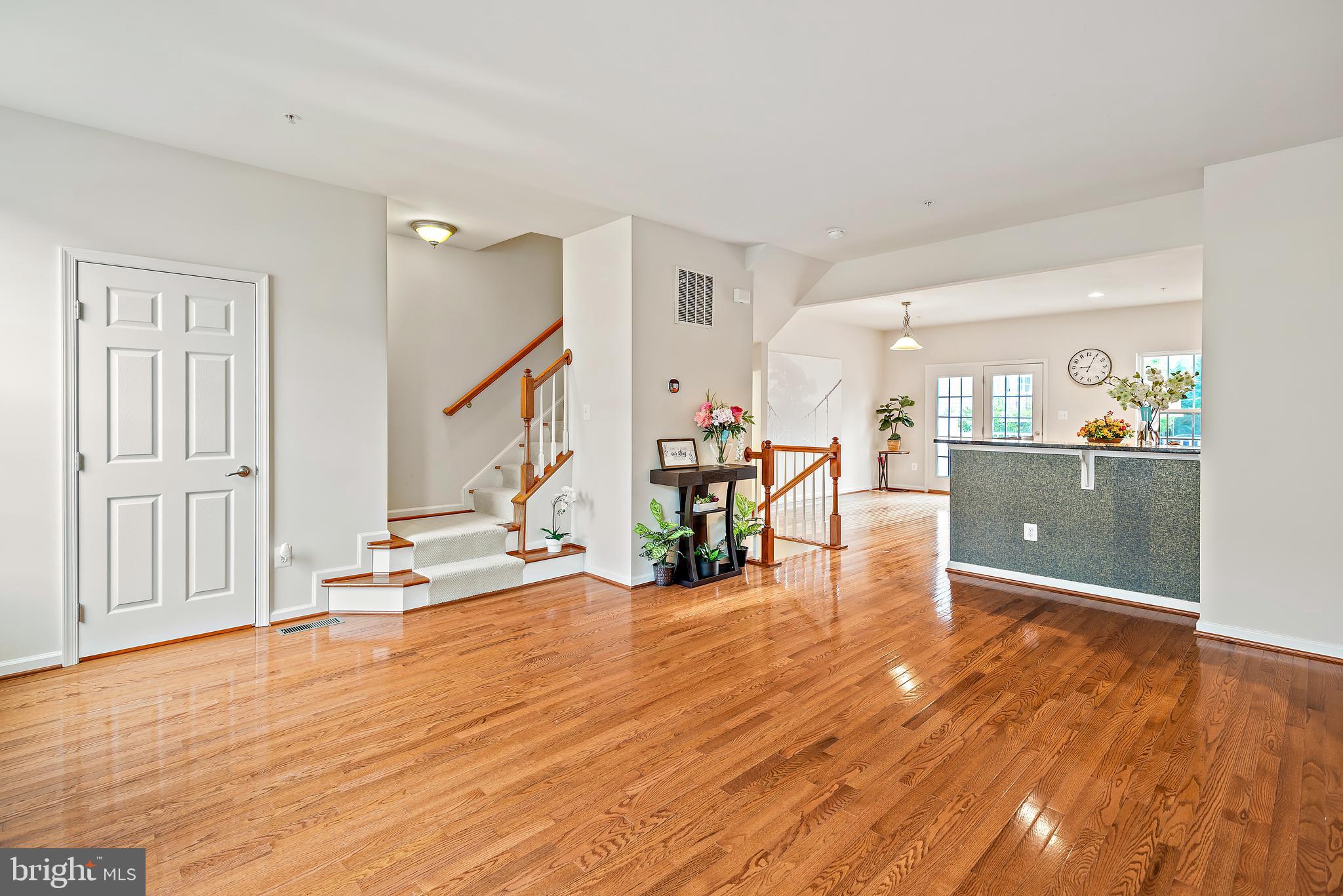 3838 Cullingworth Road Burtonsville, MD 20866 - Photo 44 of 69 a view of a livingroom with wooden floor and furniture
