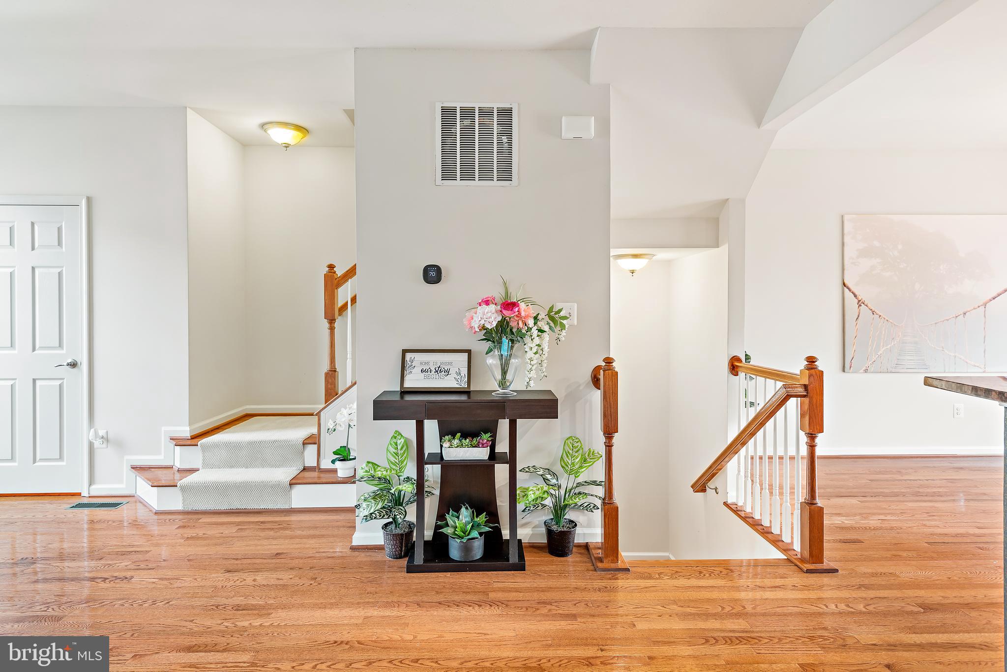 3838 Cullingworth Road Burtonsville, MD 20866 - Photo 45 of 69 a view of entryway dining room and hall with wooden floor