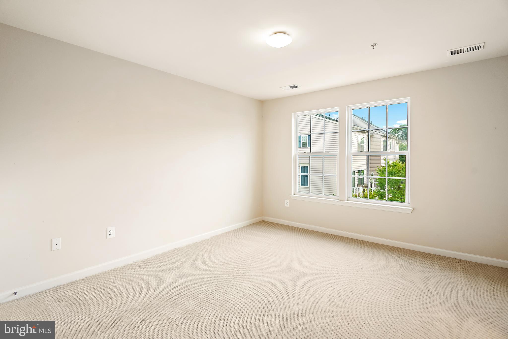 3838 Cullingworth Road Burtonsville, MD 20866 - Photo 56 of 69 an empty room with windows