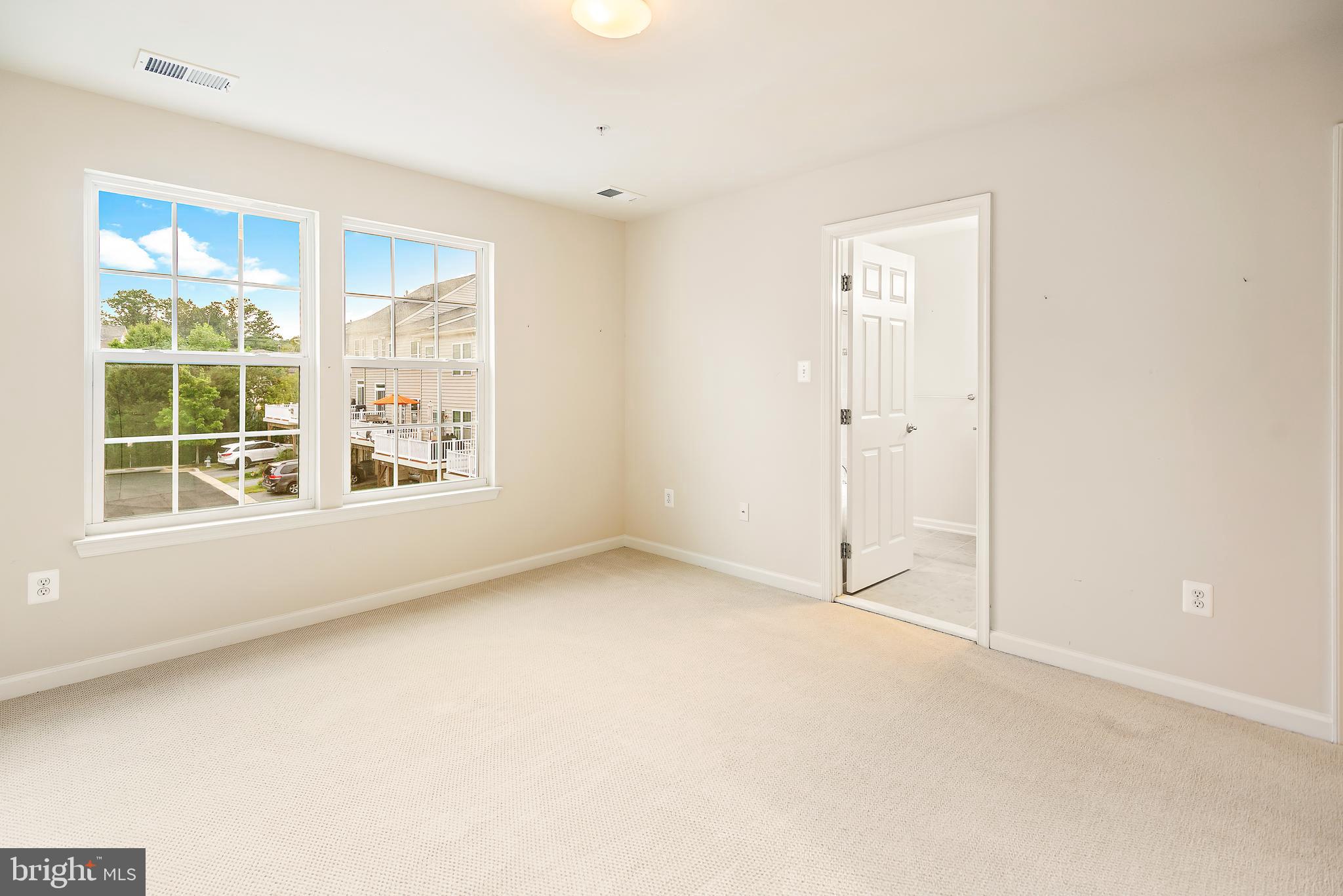 3838 Cullingworth Road Burtonsville, MD 20866 - Photo 58 of 69 an empty room with windows