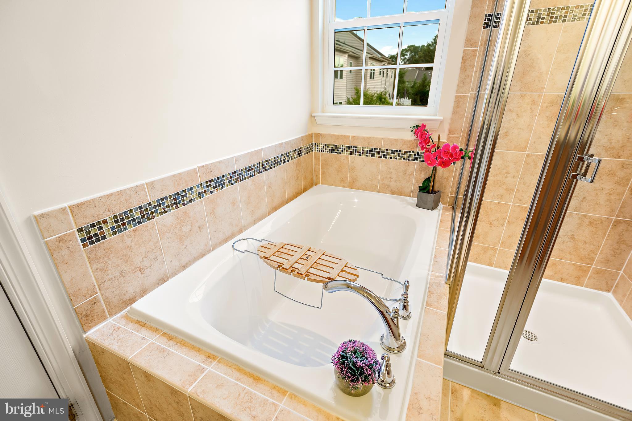 3838 Cullingworth Road Burtonsville, MD 20866 - Photo 65 of 69 a bath tub sitting next to a window