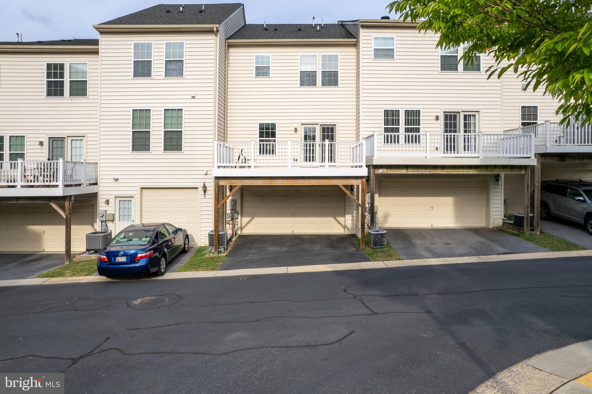 3838 Cullingworth Road Burtonsville, MD 20866 - Photo 10 of 69 a front view of a house with a parking space