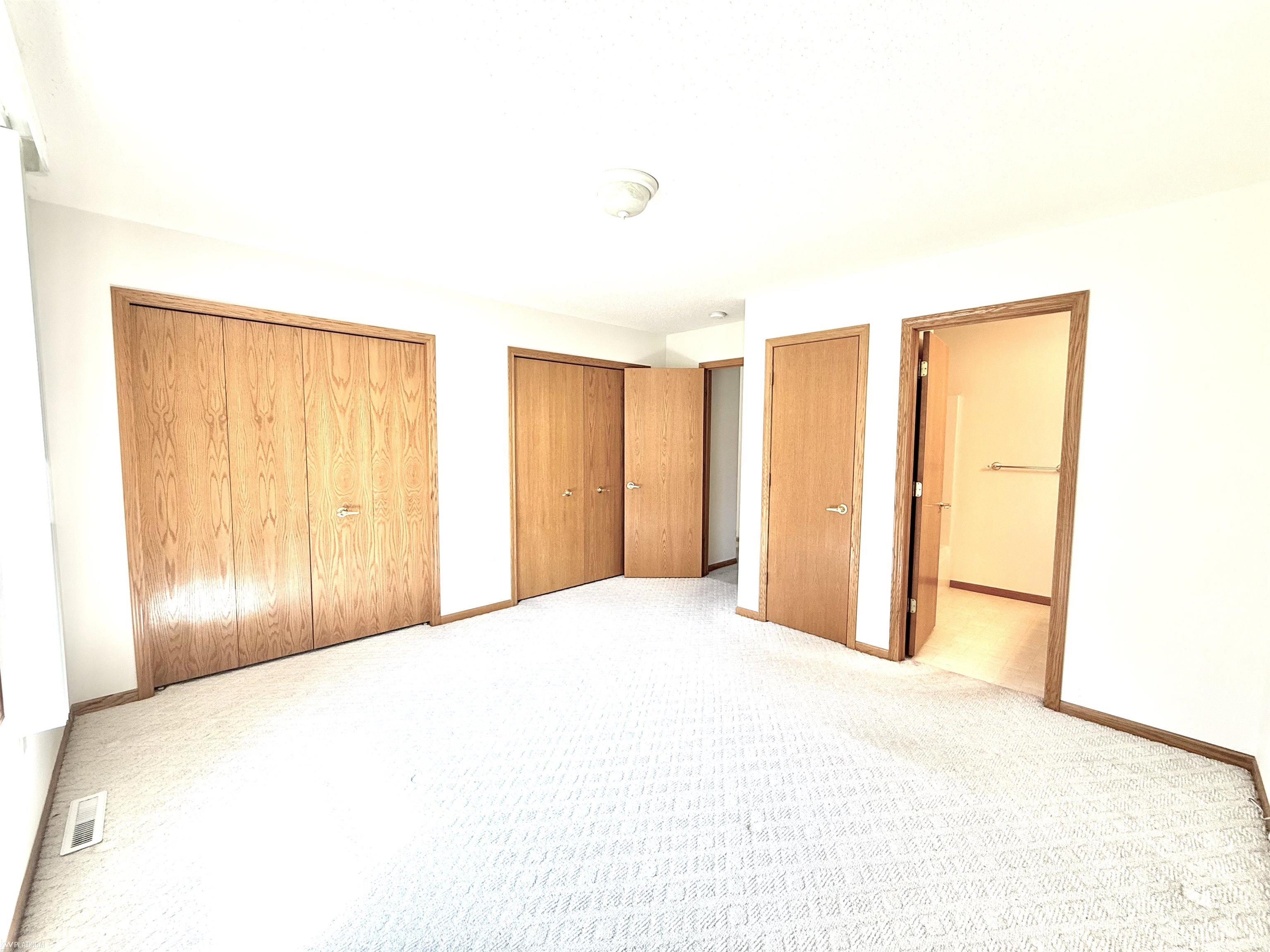 1248 South Hemlock Road Hemlock, MI 48626 - Photo 39 of 73 Master bedroom with 3 closets and en-suite bath
