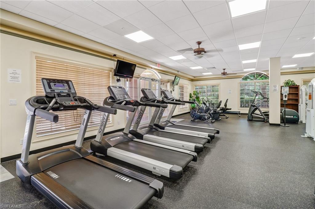 20301 Estero Gardens Circle, Unit 104 Estero, FL 33928 - Photo 38 of 43 a view of a room with gym equipment
