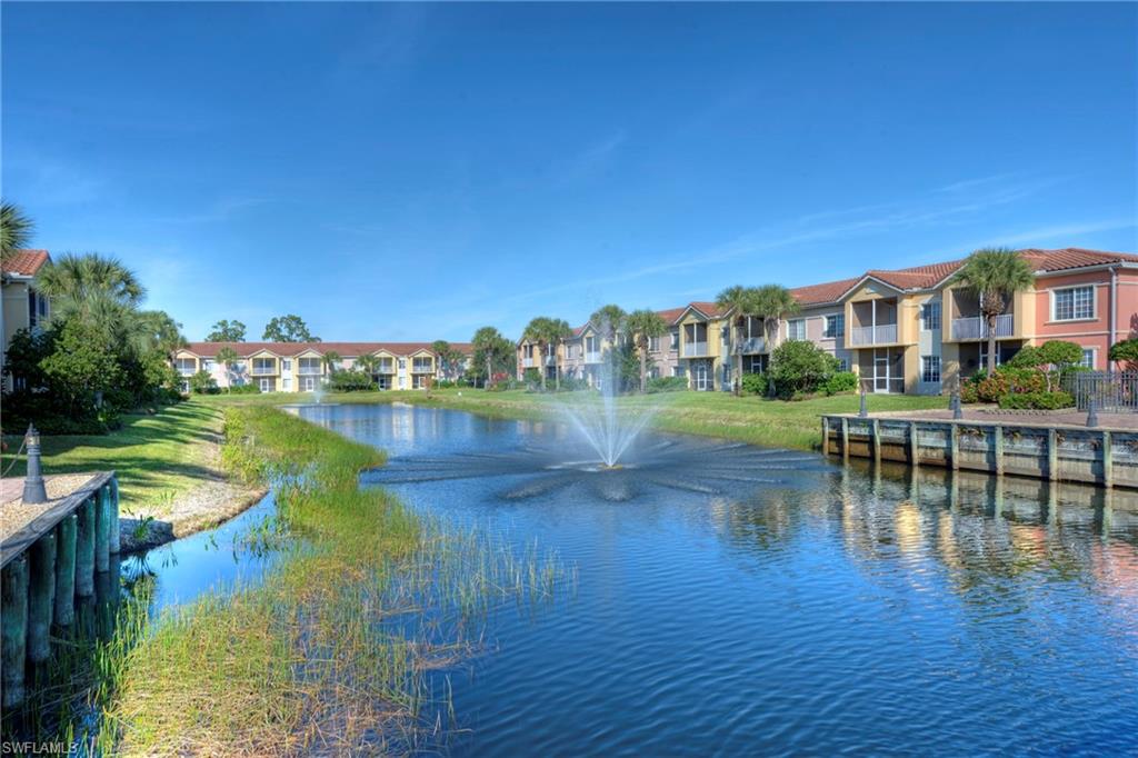 20301 Estero Gardens Circle, Unit 104 Estero, FL 33928 - Photo 39 of 43 a view of residential houses with outdoor space and lake view