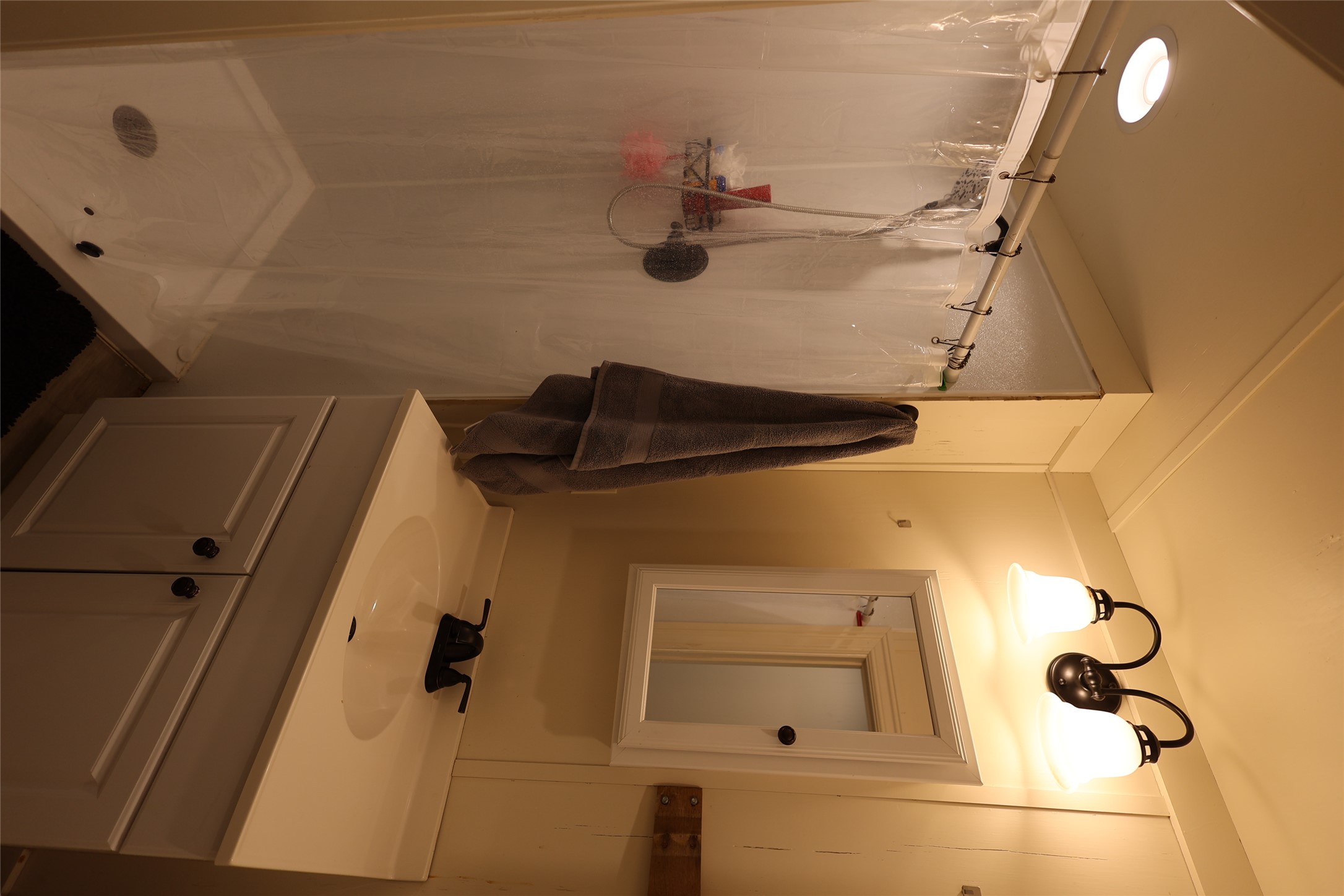 1399 Klett Ranch Road Johnson City, TX 78636 - Photo 6 of 23 a bathroom with a sink and a mirror