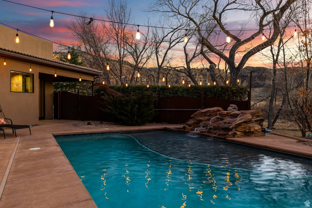 98 Bridge Road Rockville, UT 84763 - Photo 46 of 75 Pool Patio – Saltwater Pool & Rock Waterfall