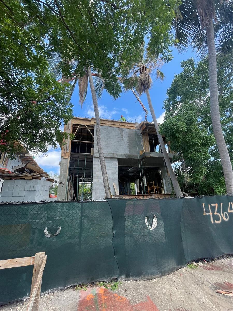 4364 Alton Road Miami Beach, FL 33140 - Photo 13 of 14 an outdoor view of house with yard