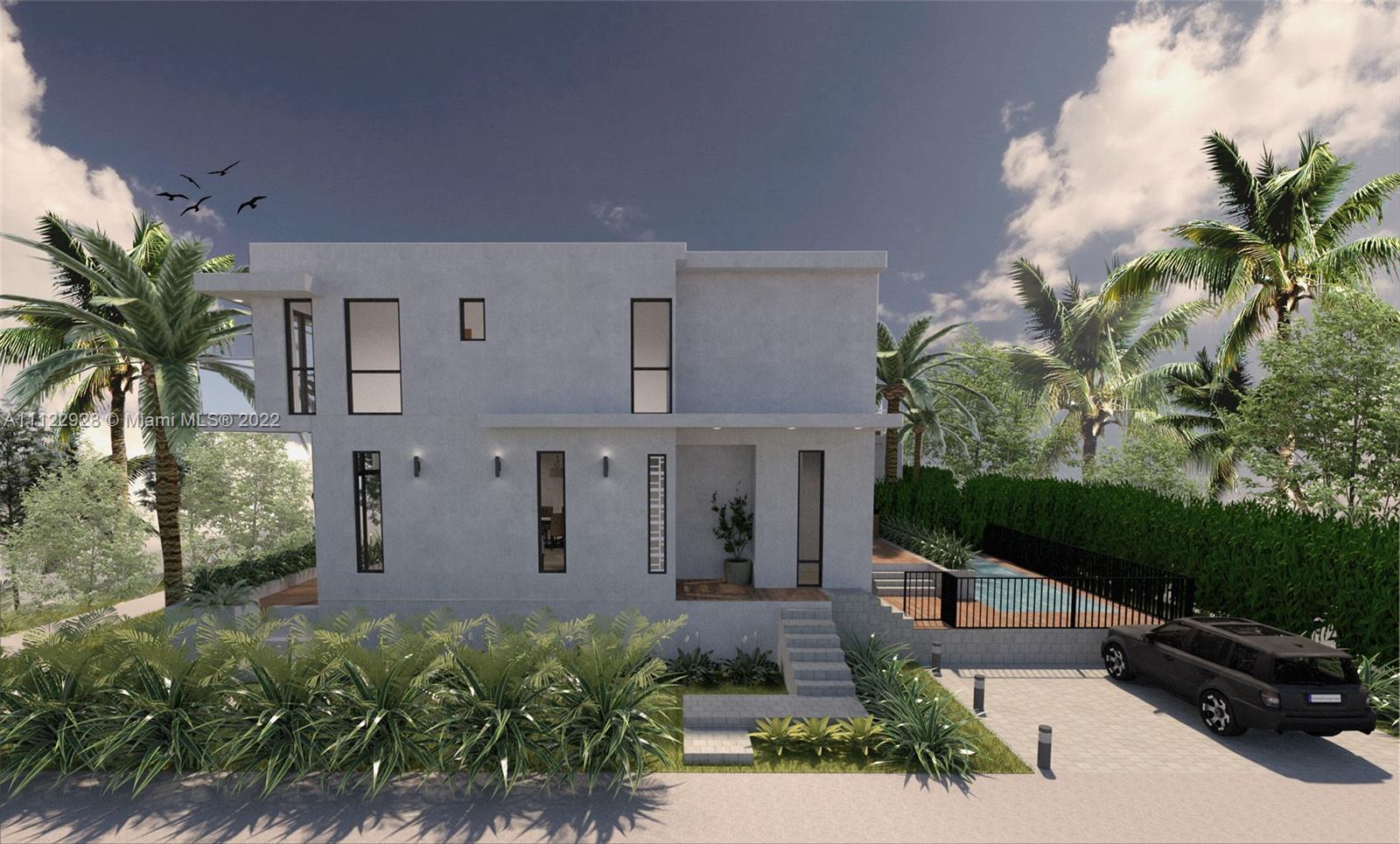 4364 Alton Road Miami Beach, FL 33140 - Photo 3 of 14 a front view of a house with a yard