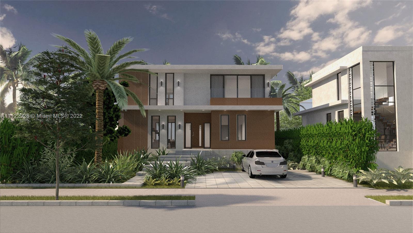 4364 Alton Road Miami Beach, FL 33140 - Photo 4 of 14 a front view of a house with a garden and plants