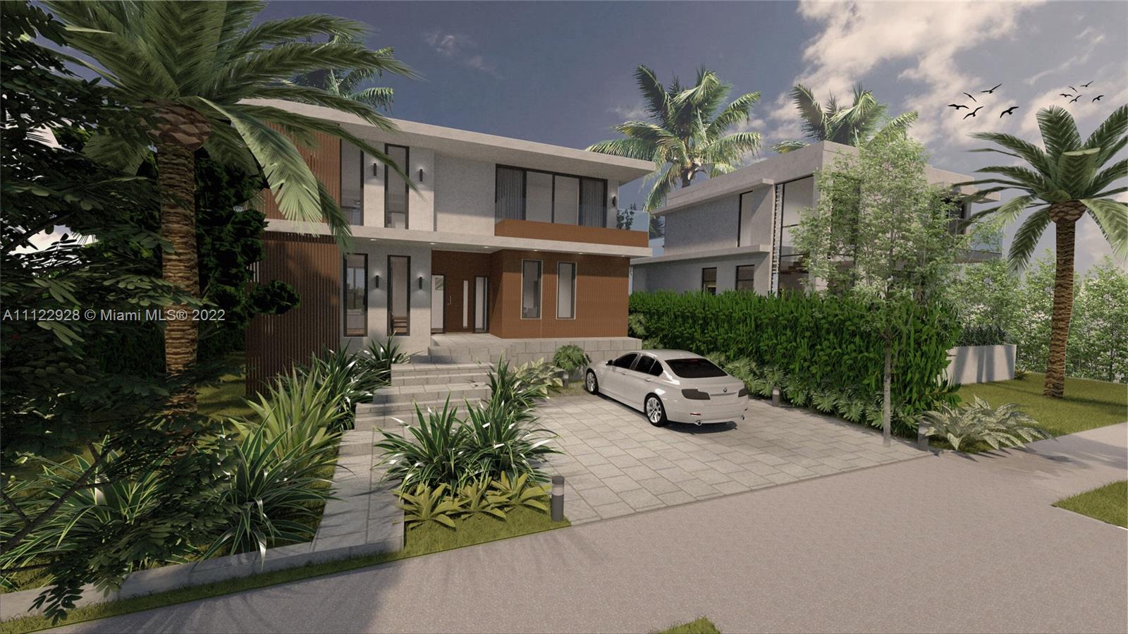 4364 Alton Road Miami Beach, FL 33140 - Photo 5 of 14 a front view of a house with garden