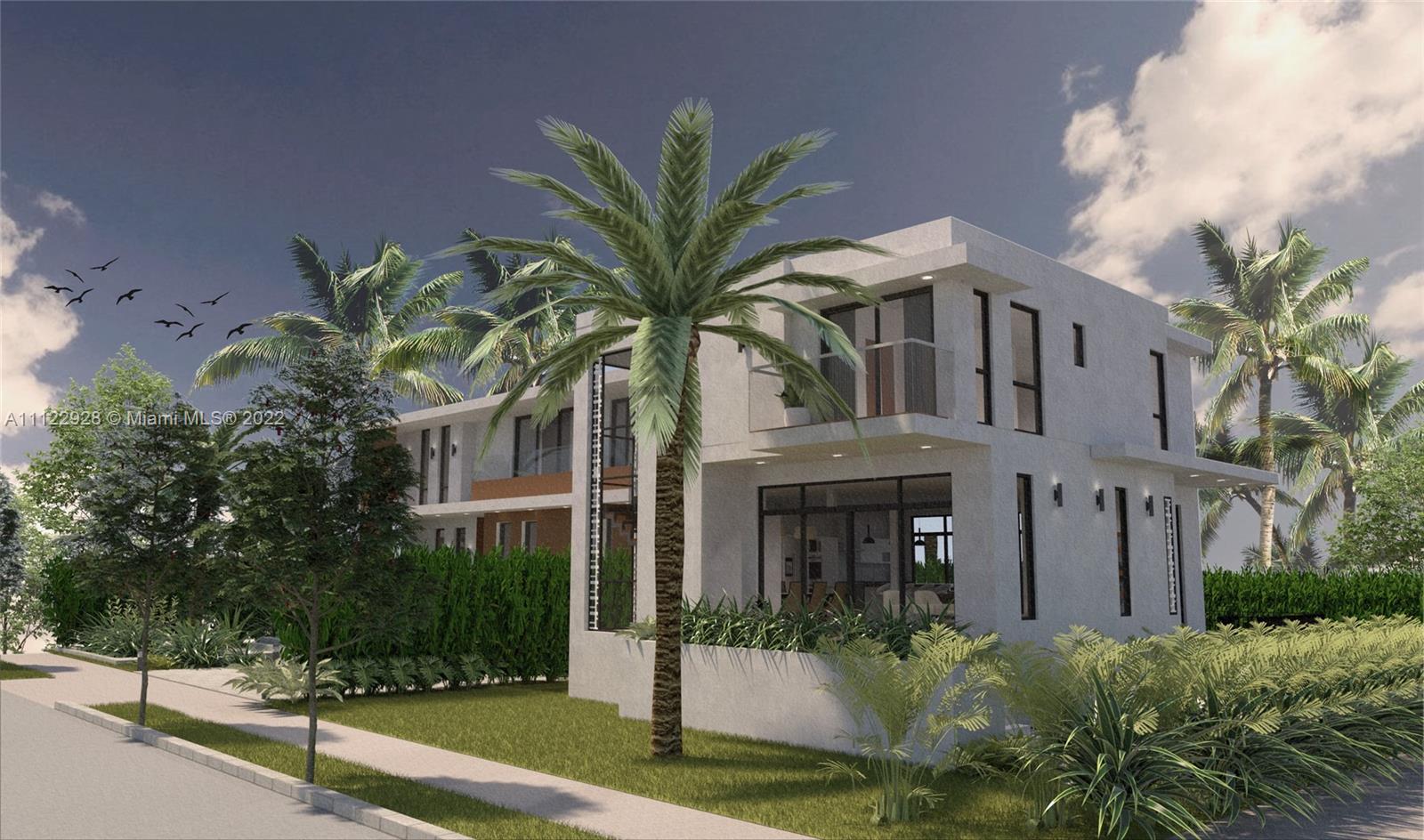 4364 Alton Road Miami Beach, FL 33140 - Photo 6 of 14 a front view of a house with a garden