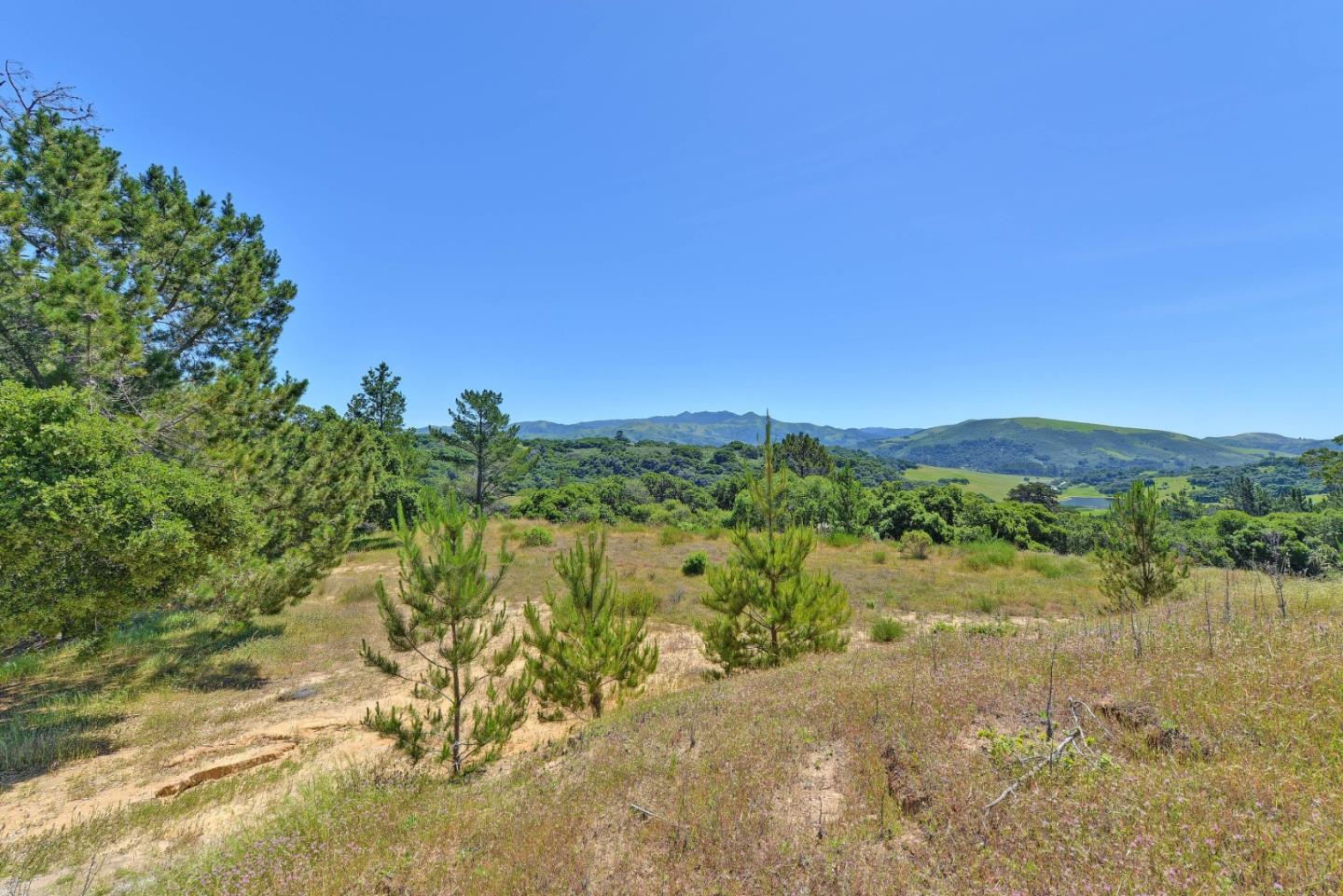 8741 Eagles Roost Road Salinas, CA 93907 - Photo 13 of 19 a view of a lake with a mountain in the background
