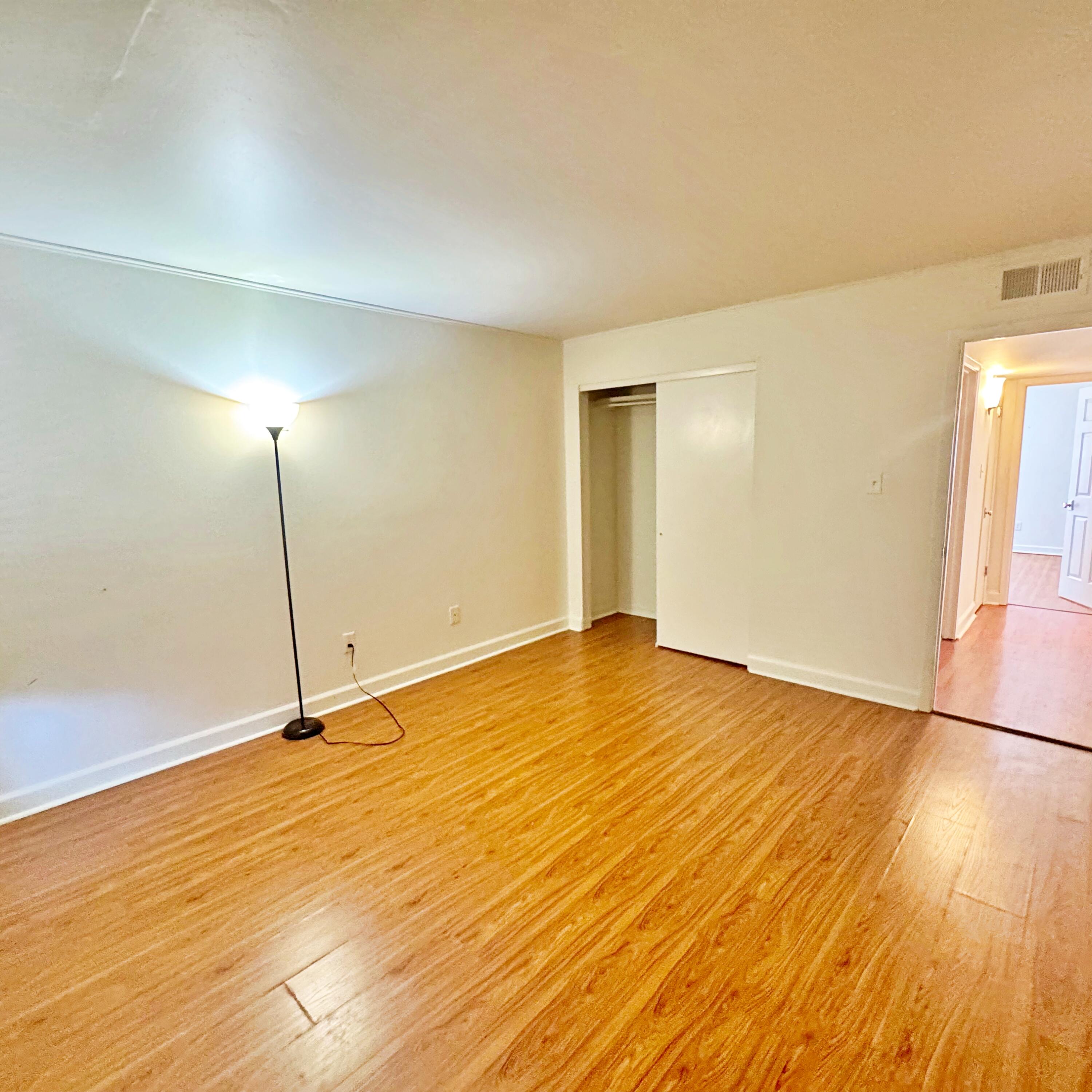 210 Pelham Road, Unit 215B Fort Walton Beach, FL 32547 - Photo 17 of 23 a view of an empty room and wooden floor