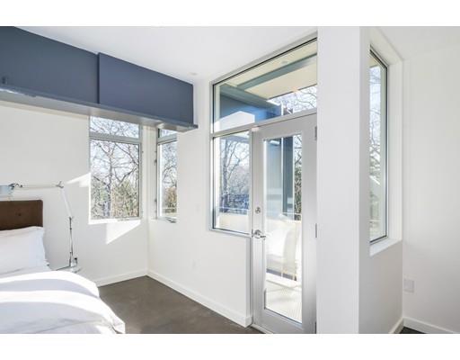 8 Bird Hill Road Lexington, MA 02421 - Photo 18 of 30 a view of a bedroom with a large window and front door