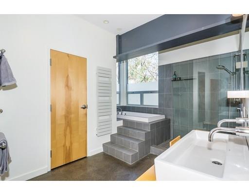 8 Bird Hill Road Lexington, MA 02421 - Photo 19 of 30 a bathroom with a sink a bathtub and a mirror