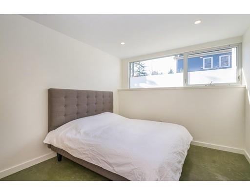 8 Bird Hill Road Lexington, MA 02421 - Photo 22 of 30 a bedroom with a bed and window