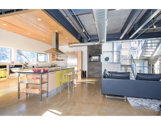 8 Bird Hill Road Lexington, MA 02421 - Photo 6 of 30 a living room with furniture and a kitchen view