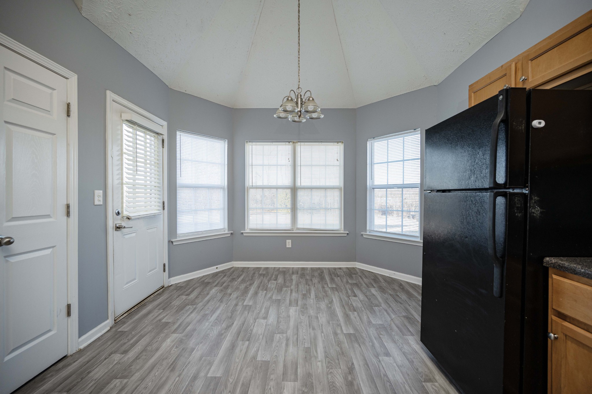 3039 Ridgewood Drive Christiana, TN 37037 - Photo 10 of 20 a view of empty room with wooden floor and window