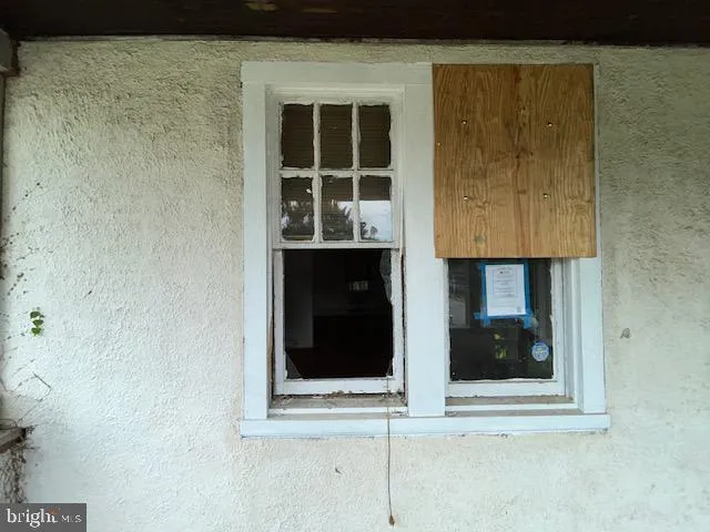 a wall with a sign on it