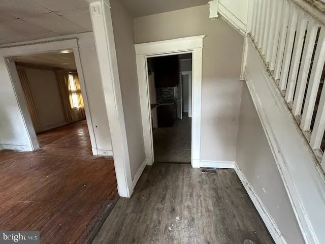 a view of entryway with wooden floor