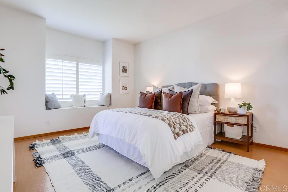 1520 Via Risa San Marcos, CA 92078 - Photo 19 of 34 a bedroom with a bed and a window