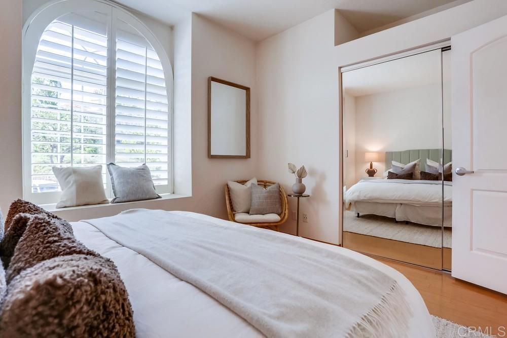 1520 Via Risa San Marcos, CA 92078 - Photo 28 of 34 a bedroom with a bed and a large window