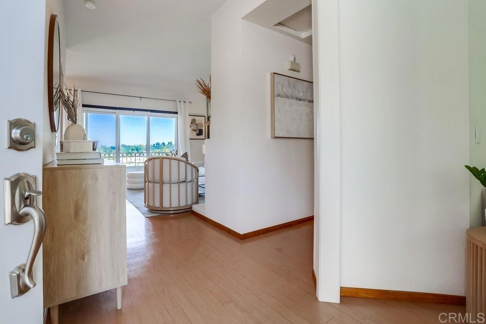 1520 Via Risa San Marcos, CA 92078 - Photo 4 of 34 a living room with furniture and a window