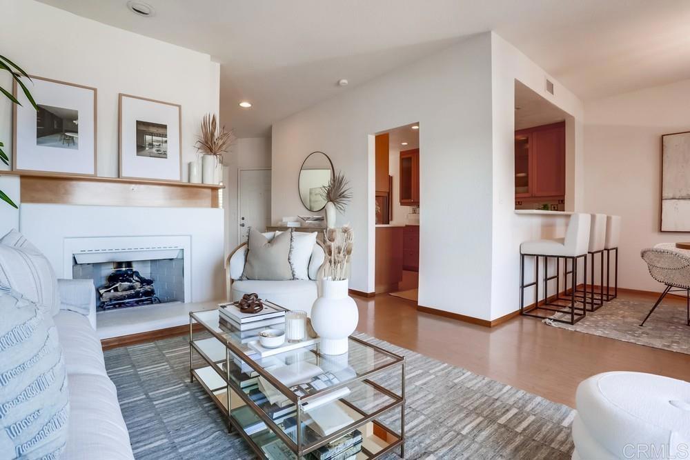 1520 Via Risa San Marcos, CA 92078 - Photo 8 of 34 a living room with furniture and a fireplace