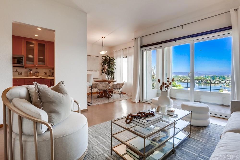 1520 Via Risa San Marcos, CA 92078 - Photo 10 of 34 a living room with furniture and a wooden floor