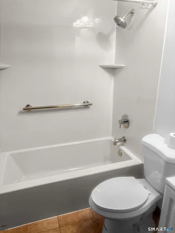 a workspace with furniture and window