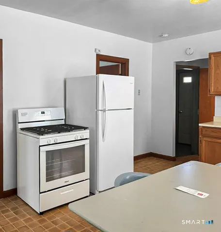 a view of a house with a street