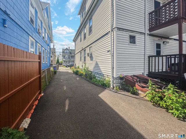 a view of the street with cars