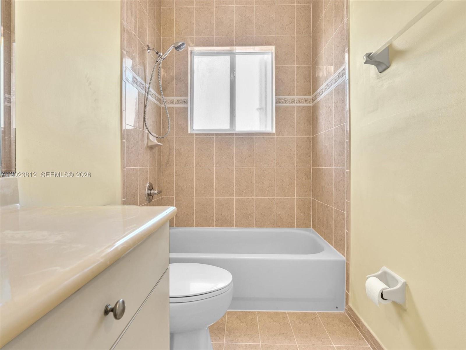 2864 Southwest 138th Path Miami, FL 33175 - Photo 31 of 40 a bathroom with a bathtub and a toilet