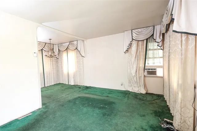 a kitchen with a stove and a refrigerator
