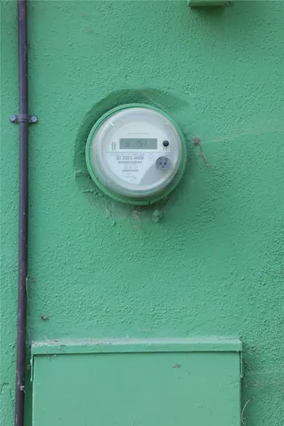 a view of a backyard with table and chairs
