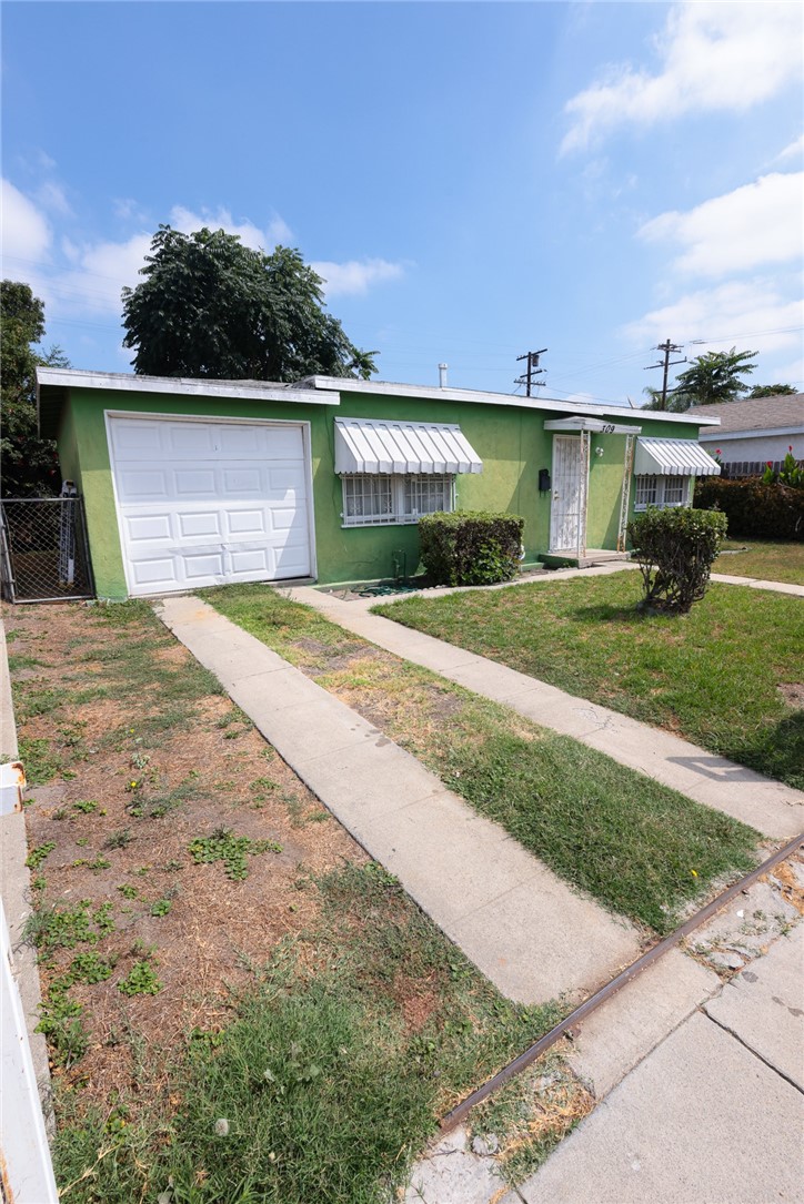 309 West Reeve Street Compton, CA 90220 - Photo 6 of 37 a view of a yard in front of house