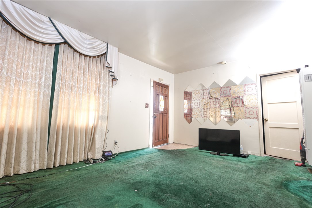309 West Reeve Street Compton, CA 90220 - Photo 8 of 37 a view of a livingroom with furniture and staircase