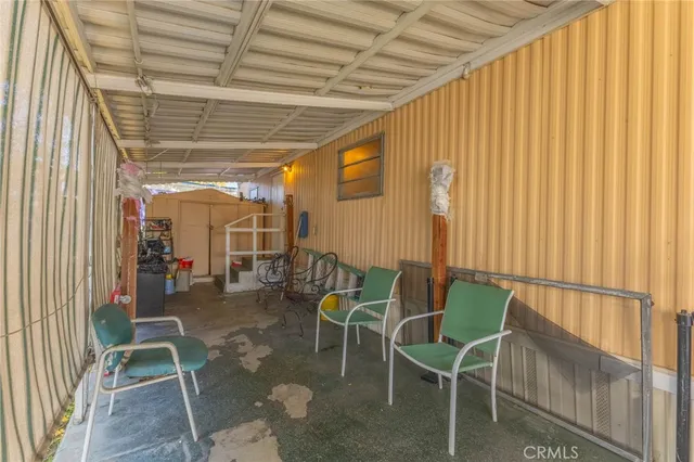 a view of yard with patio