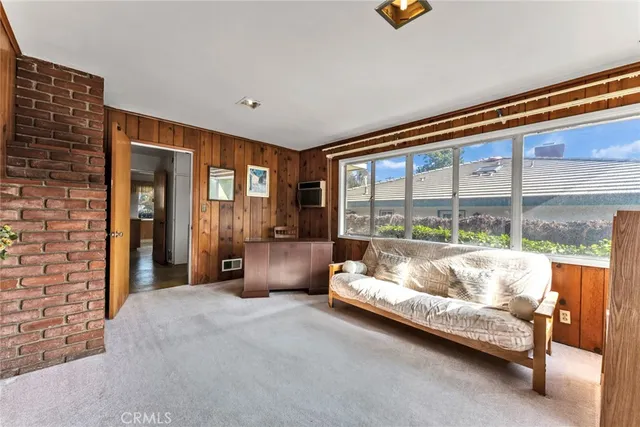 a view of a kitchen from the hallway