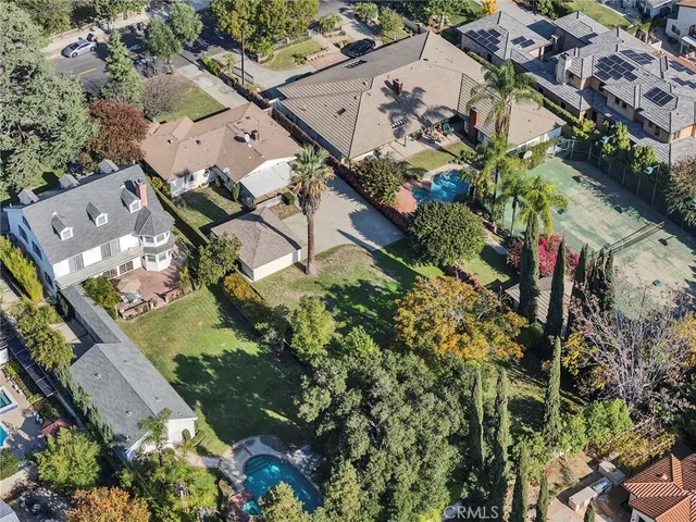 an aerial view of a houses with outdoor space