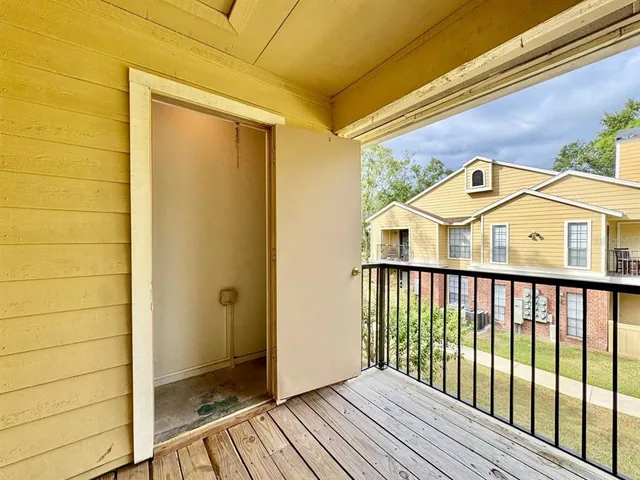 a view of a balcony with a small space