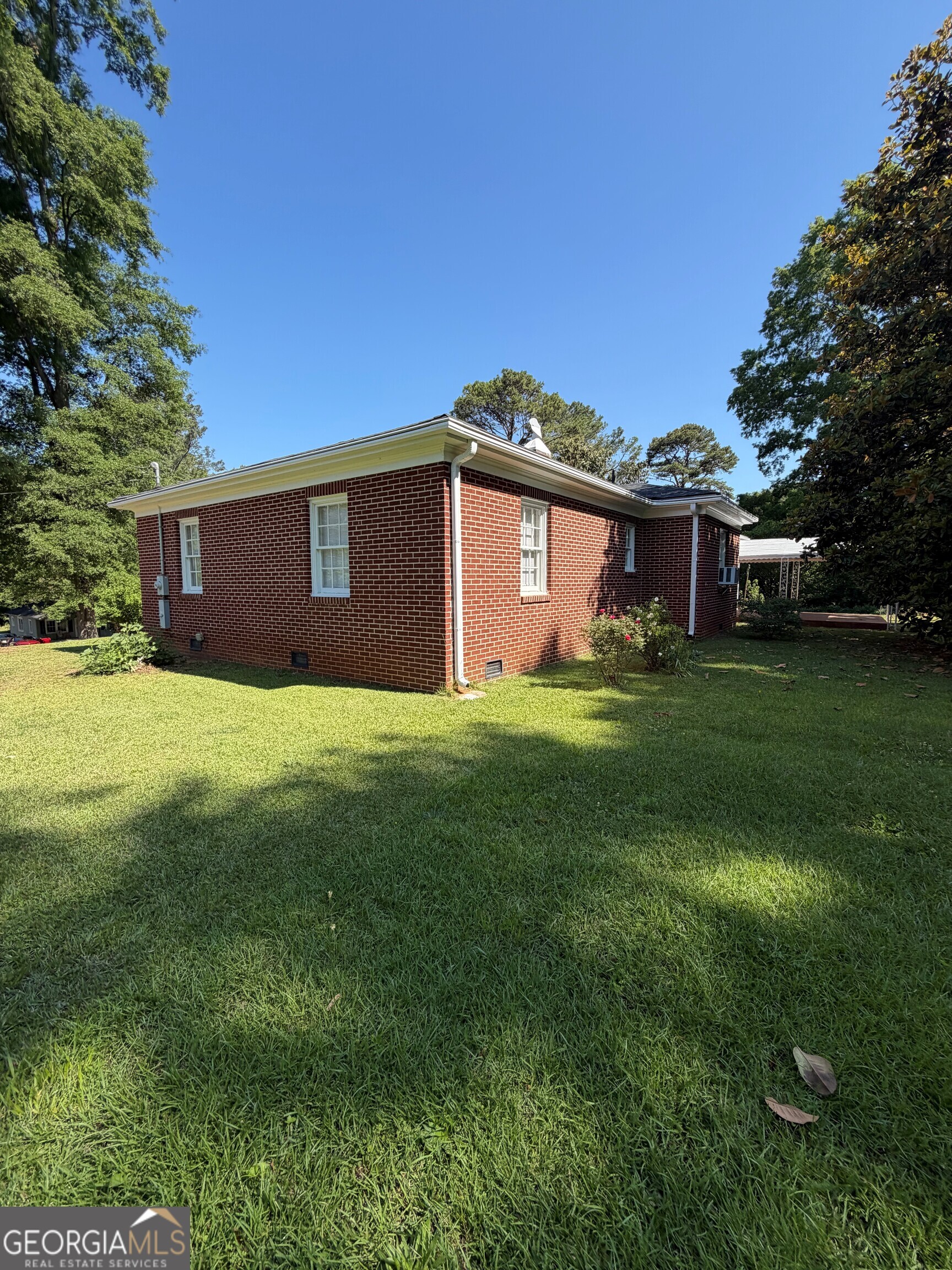 2619 Maple Road Southeast Rome, GA 30161 - Photo 23 of 31 a view of a house with a yard