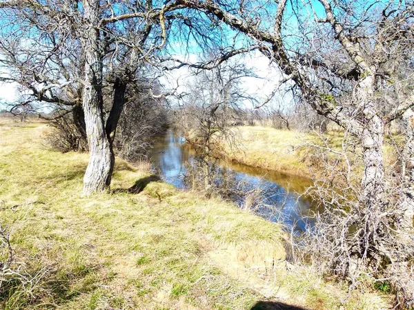 a view of yard covered with snow