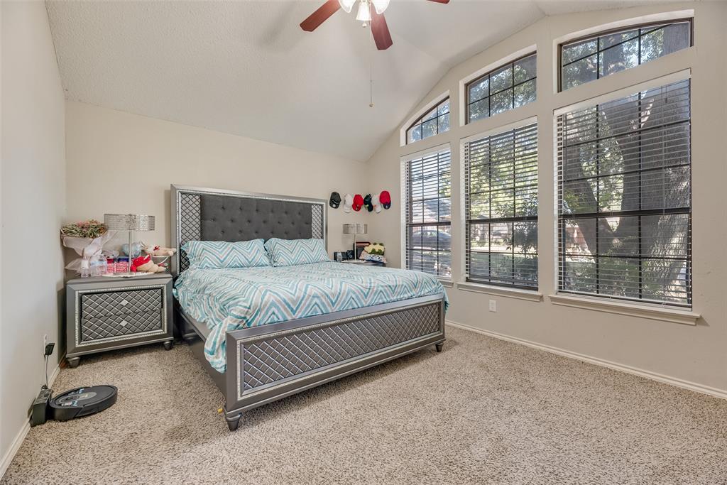 4102 Autumn Ridge Court Arlington, TX 76016 - Photo 13 of 20 Bedroom featuring carpet floors, a ceiling fan, and high vaulted ceiling