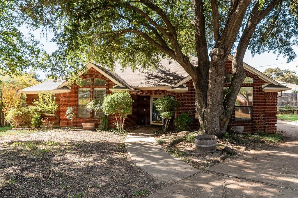 4102 Autumn Ridge Court Arlington, TX 76016 - Photo 2 of 20 View of front of home with brick siding and a shingled roof