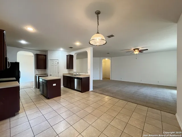 a view of a big room with wooden floor