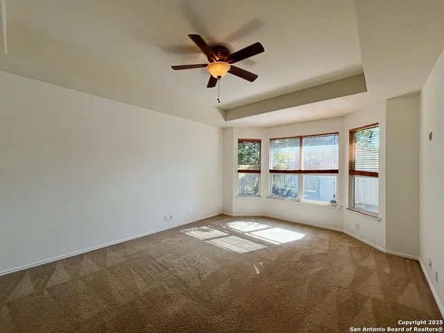 a bathroom with a shower and a toilet