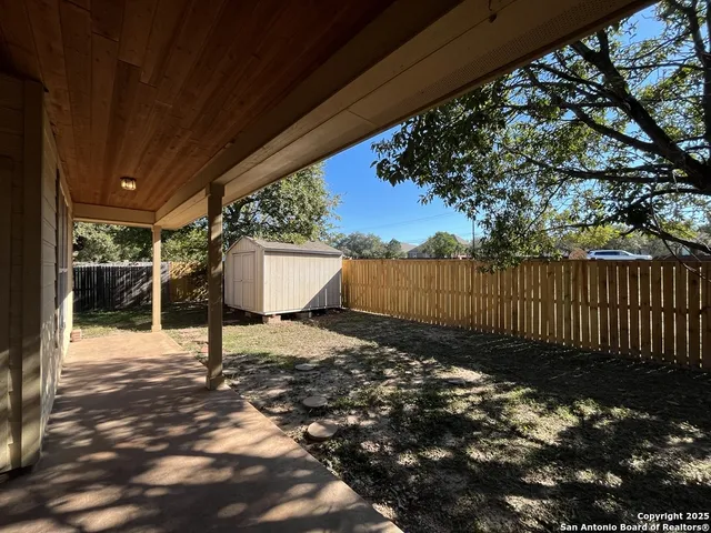 a view of a house with a park