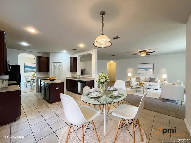 a view of a dining room with furniture